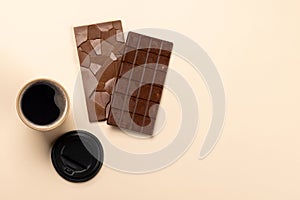 Coffee break bliss: Chocolate bars paired with a cup of coffee photo