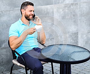 Coffee break brings physical and mental wellbeing. Brief coffee break provides employees with quick ways to relax. Man