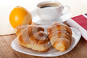Coffee break with croissant