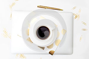 Coffee break. Feminine styling office desk gold