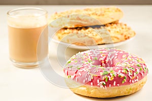 Coffee break with fresh sugary donut and dry biscuit/Coffee brea