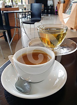Coffee break with tea in coffee shop
