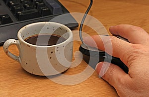 Coffee break to the computer photo