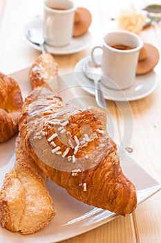 Coffee and Brioches for energetic breakfast photo
