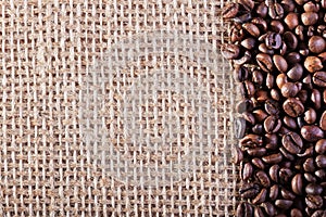 Coffee on burlap sack background