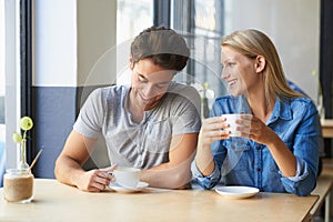 Coffee, cafe or happy couple laughing on date talking or speaking of anniversary on holiday vacation. Tea drink, woman