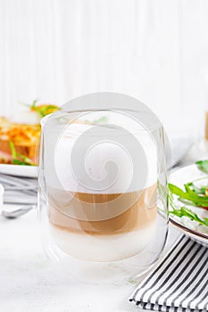 Coffee cafe latte macchiato in a glass photo