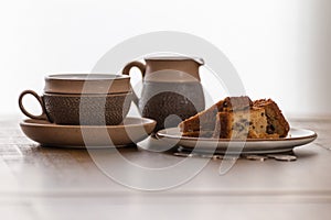 Coffee Cake & Cream Time and coins on the table