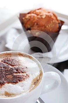 Coffee cappuccino with dusting cocoa