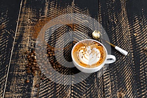Coffee cappuccino on tabel wooden background
