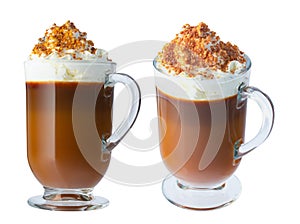 Coffee, cappuccino with whipped cream in a glass, Irish glass. Ground nuts, chocolate chips. Isolate on a white background.