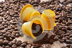 coffee capsules with ground coffee and coffee beans