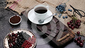 Coffee with chocolate and brown sugar. Close-up video shooting, dark background