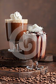 Coffee and chocolate drinks with whipped cream