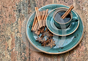 Coffee with cinnamon and star anise spices. Vintage style