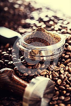 Coffee.Coffee beans. Coffee beans and portafilter. Toned image photo