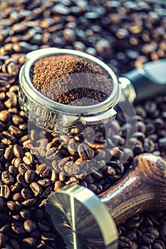 Coffee.Coffee beans. Coffee beans and portafilter. Toned image photo