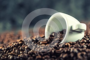 Coffee. Coffee beans. Coffee cup full of coffee beans. Toned image