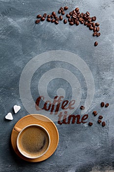 Coffee composition with cup and coffee bean