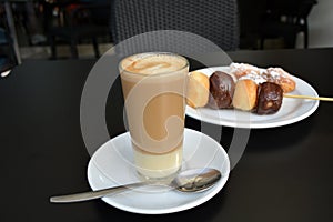Coffee with condensed milk and chocolate cake pops