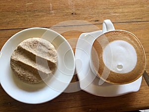 Coffee and cookie . Latte moon art.