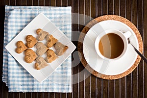 Coffee cookies with coffee in cup