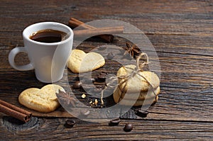 Coffee and cookies in the shape of a heart
