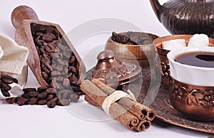 Coffee in copper coasters with accessories for coffee-drinking o photo