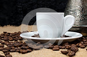 Coffee copper and white cup. Greek coffee with water and coffee pot. Turkish coffee and beans.