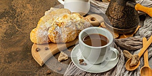 Coffee and croissant, good morning and breakfast concept