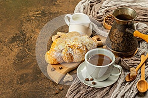 Coffee and croissant, good morning and breakfast concept