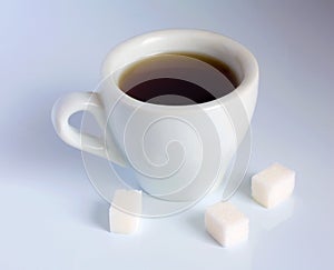 Coffee and cubes of sugar