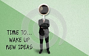 Coffee cup as a head of a businessman and text TIME TO WAKE UP