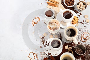 Coffee cup assortment on light background