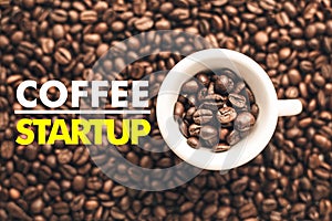 Coffee cup on background with message `COFFEE STARTUP`