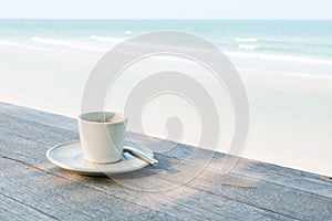 Coffee cup on the beach