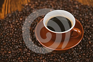 Coffee cup and beans background