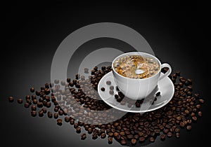 Coffee cup and beans on black background