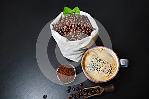 Coffee cup, beans, ground powder