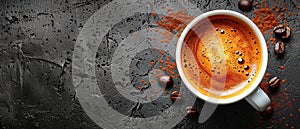 Coffee cup and beans on old kitchen table. Top view with copyspace for your text