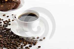 Coffee cup and beans on white background