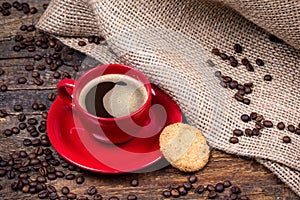 Coffee cup with biscuit and gunny textile