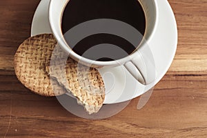 Coffee cup and biscuits