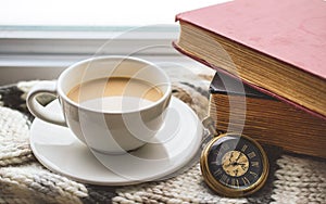 Coffee Cup with Book and on The Scraf in Winter Season with Vin