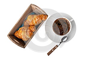 Coffee cup and box with croissants isolated on a white background with clipping path