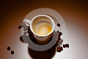 Coffee cup on brown background