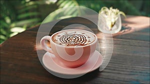 Coffee Cup of Cappuccino, Latte or Mocha with Frothed Milk Foam Design on Coffee