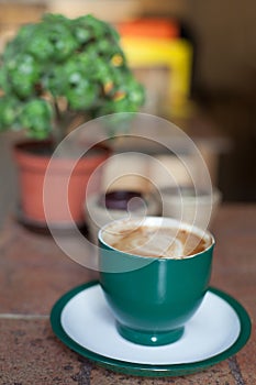 Coffee cup on ceramic table