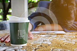 coffee cup clock and newspaper work on table