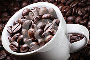 Coffee cup with coffee beans